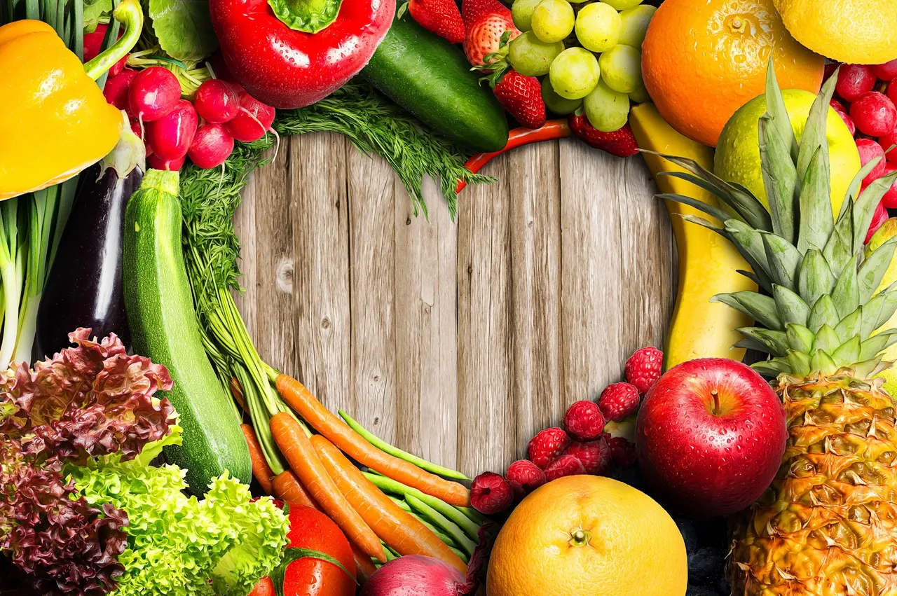 Fresh fruits and vegetables arranged to represent healthy eating
