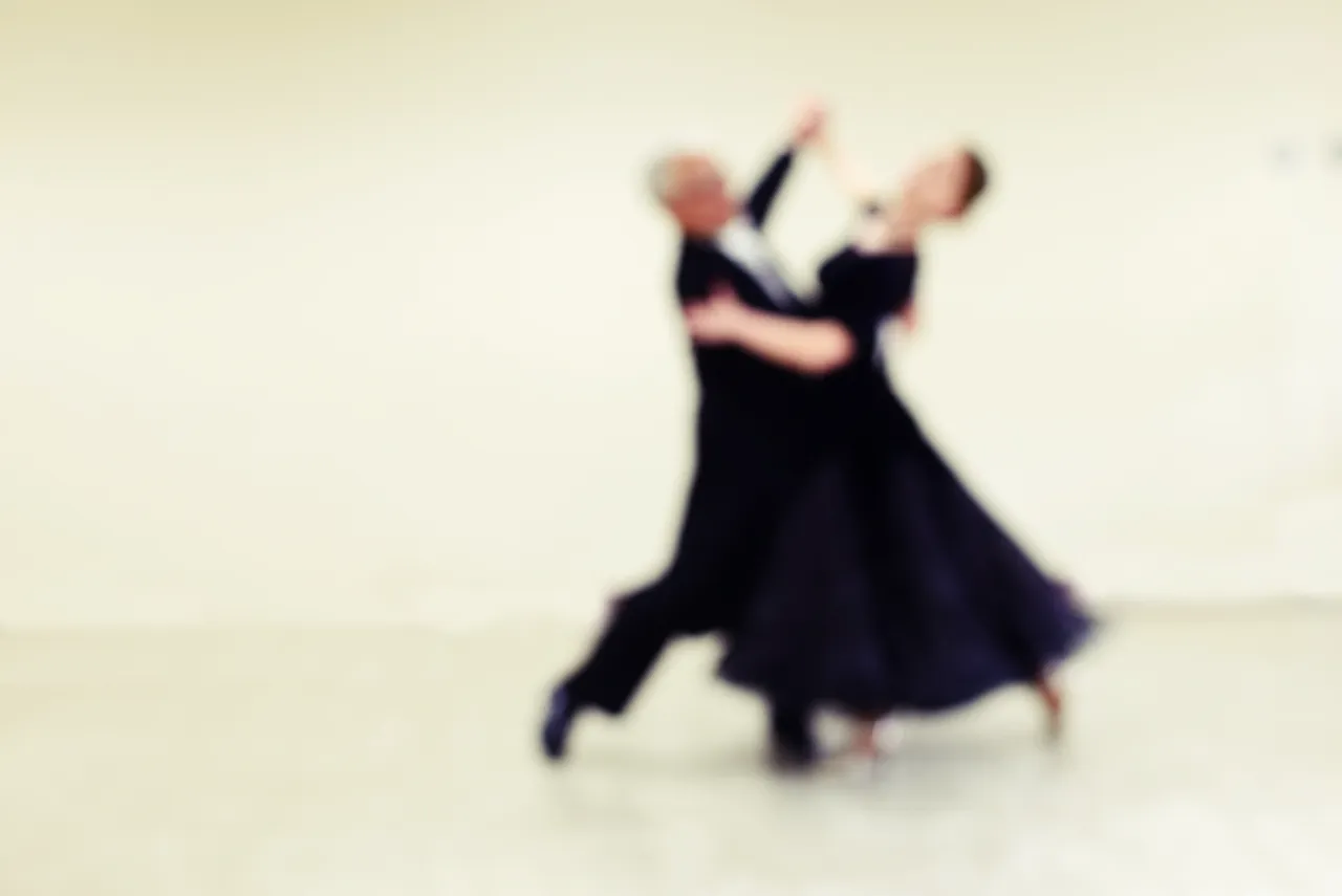Couple dancing tango illustrating movement and connection as a way to reduce stress